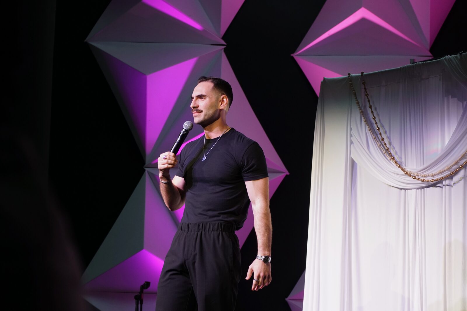 Zaid Fouzi mid-bit at OU Arab Students Comedy Night, Norman OK